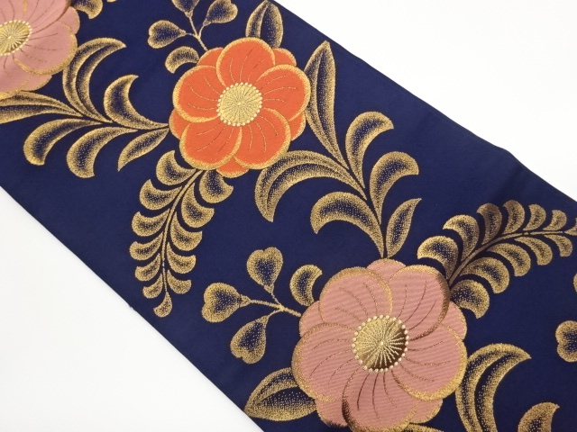 Nagoya obi woven with twisted plum and leaf pattern